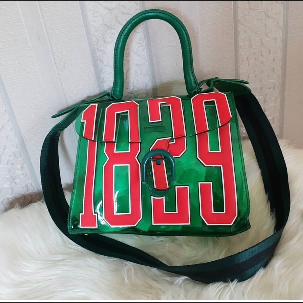 DELVAUX  GREEN TINTED VINYL 1829 BAG